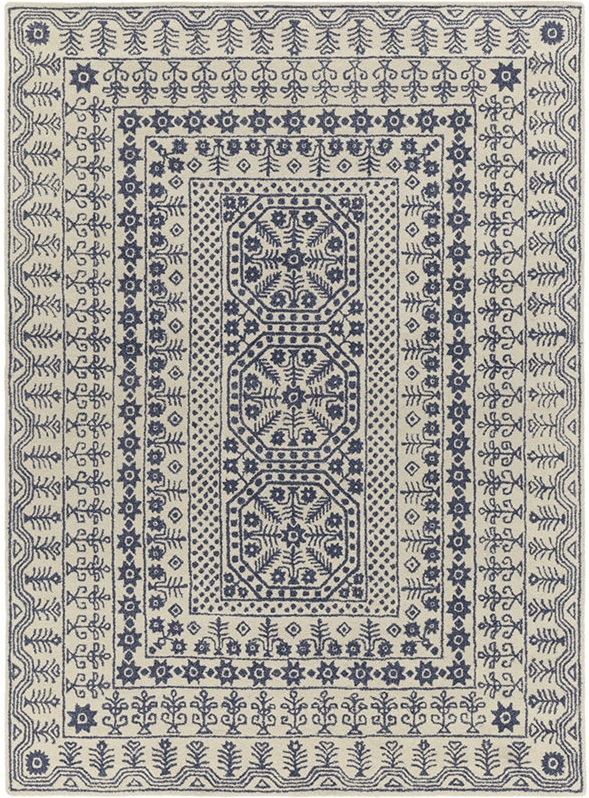 Navy blue Moroccan patterned area rug.