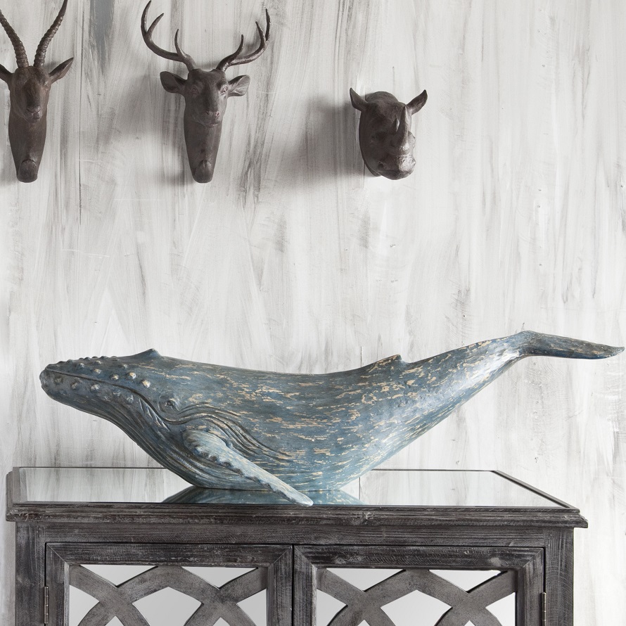 蓝鲸茶几装饰为沿海主题家居装饰构思。